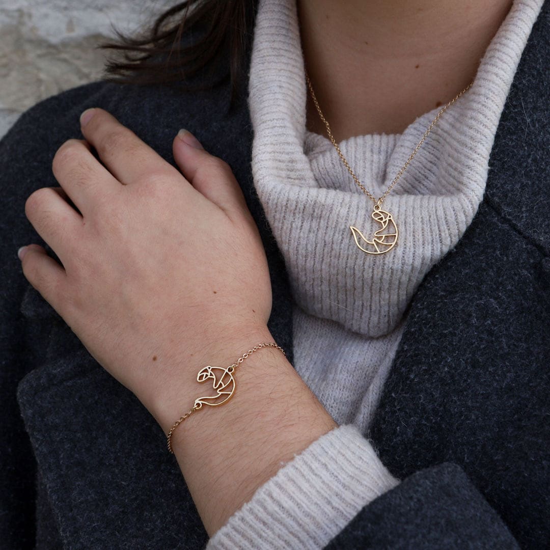 Ensemble bracelet et collier parrure or chaine animal totem loutre